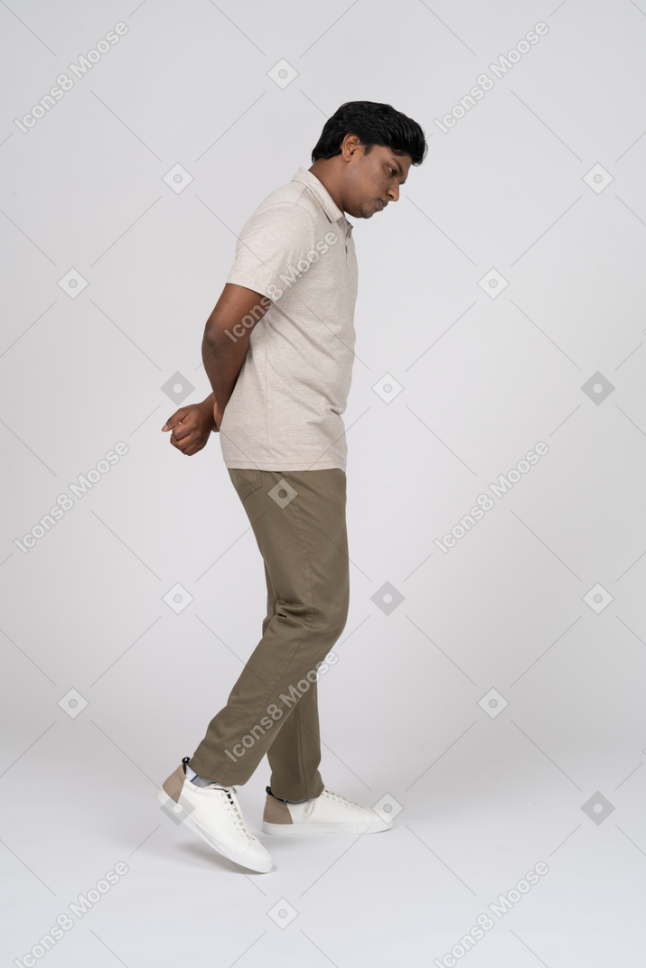 Man in casual clothes walking