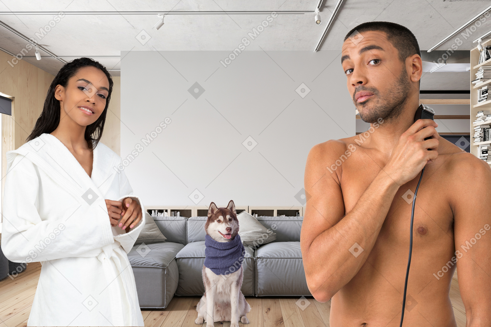 A man and woman are standing in a living room with a husky dog