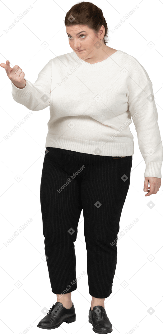 Plus size woman in casual clothes looking at camera
