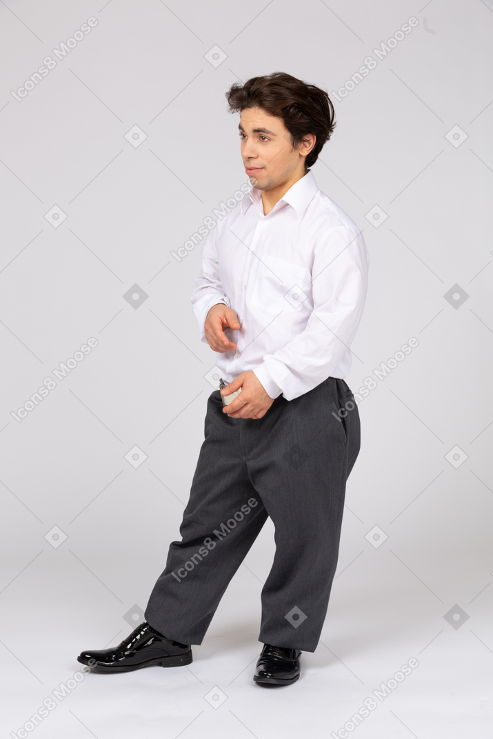 Relaxed man leaning on one leg