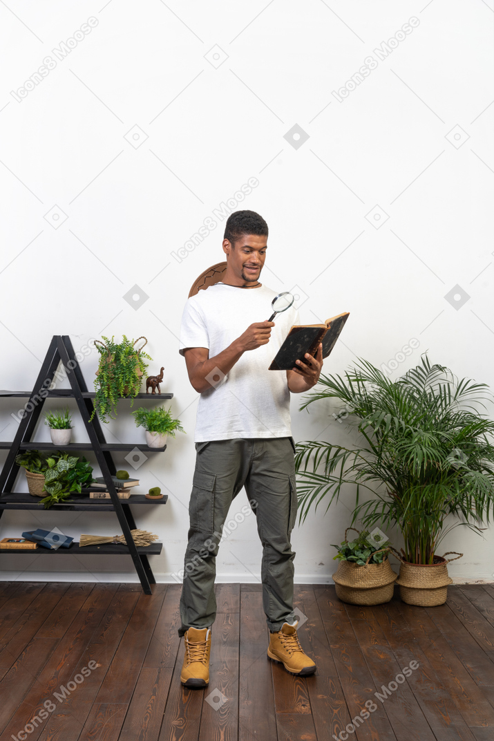 Good looking young man with a book