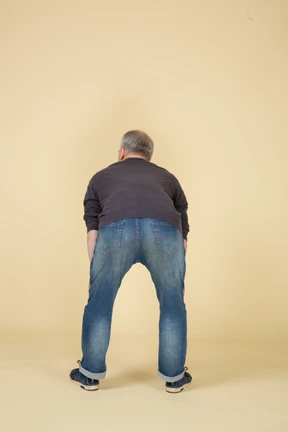 Man in casual clothes posing