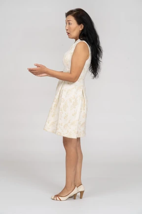 Woman in a white dress standing