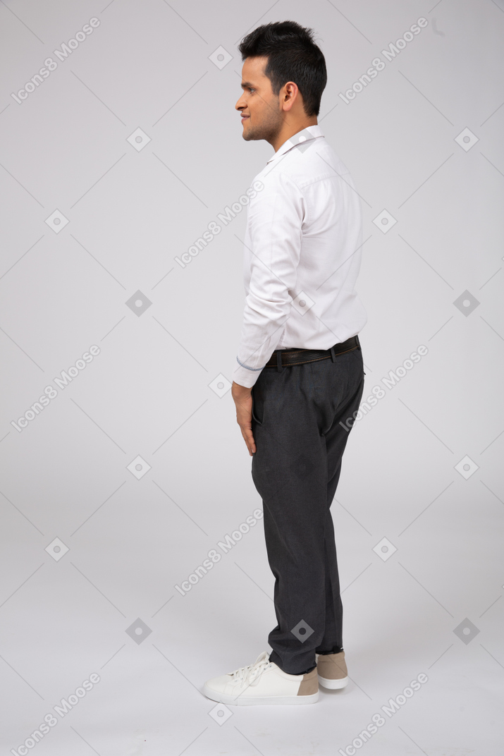 Man in white shirt standing