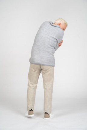 Back view of man leaning over