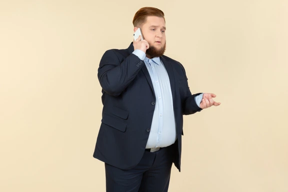 Twice the Man, Half the Size. Studio Shot of an Overweight Man