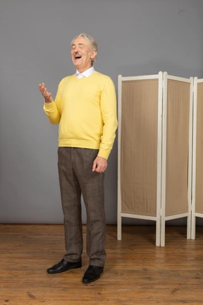 Front view of a serious old man looking at camera