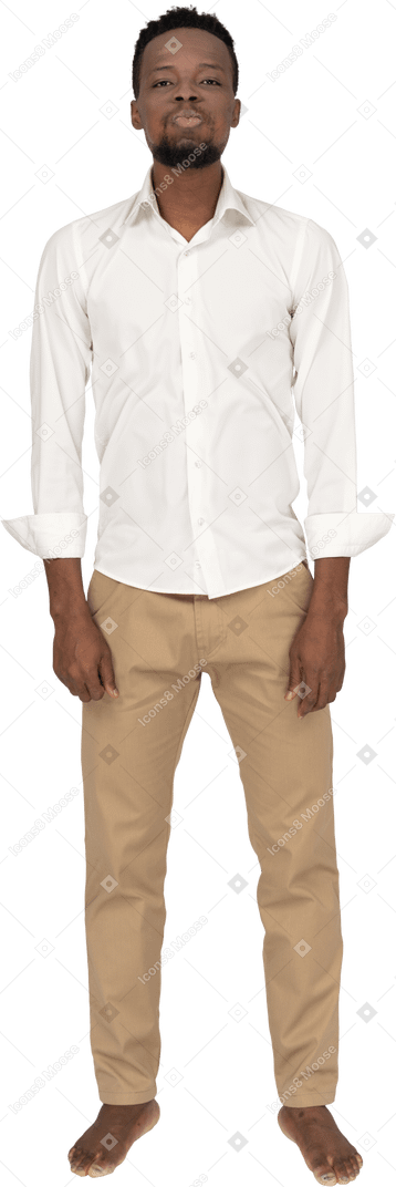 Man in white shirt standing