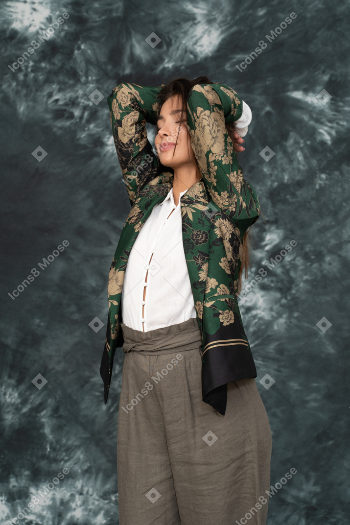 Three-quarter portrait of contented woman in japanese jacket