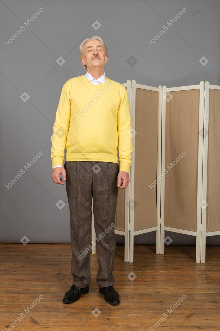 Front view of a arrogant old man looking at camera