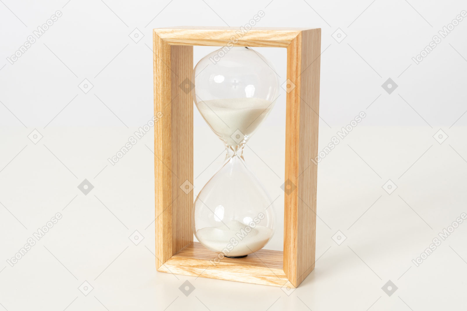 Wooden hourglass on a white background
