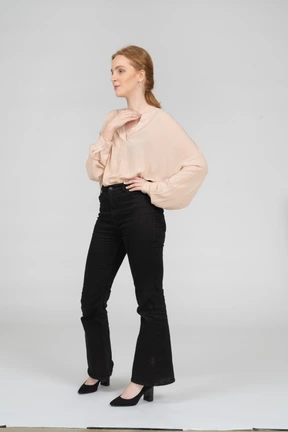 Woman in beautiful blouse standing