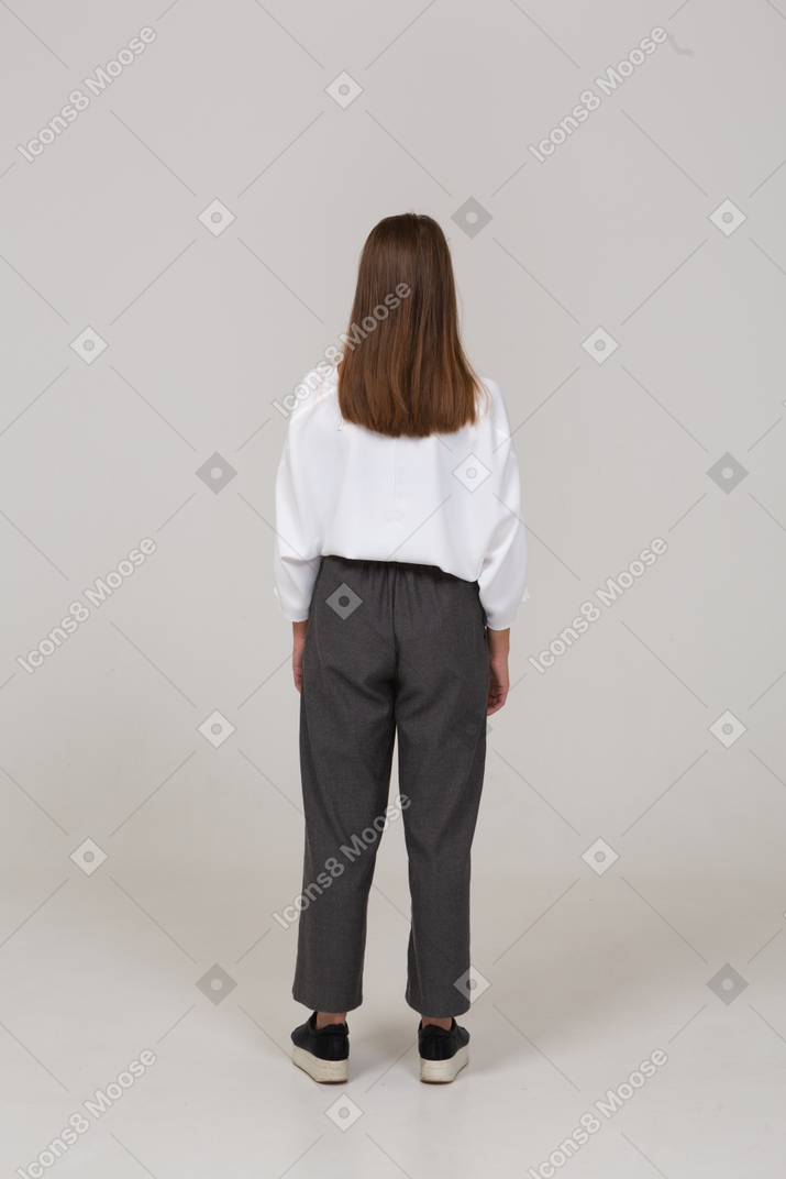 Back view of a young lady in office clothing