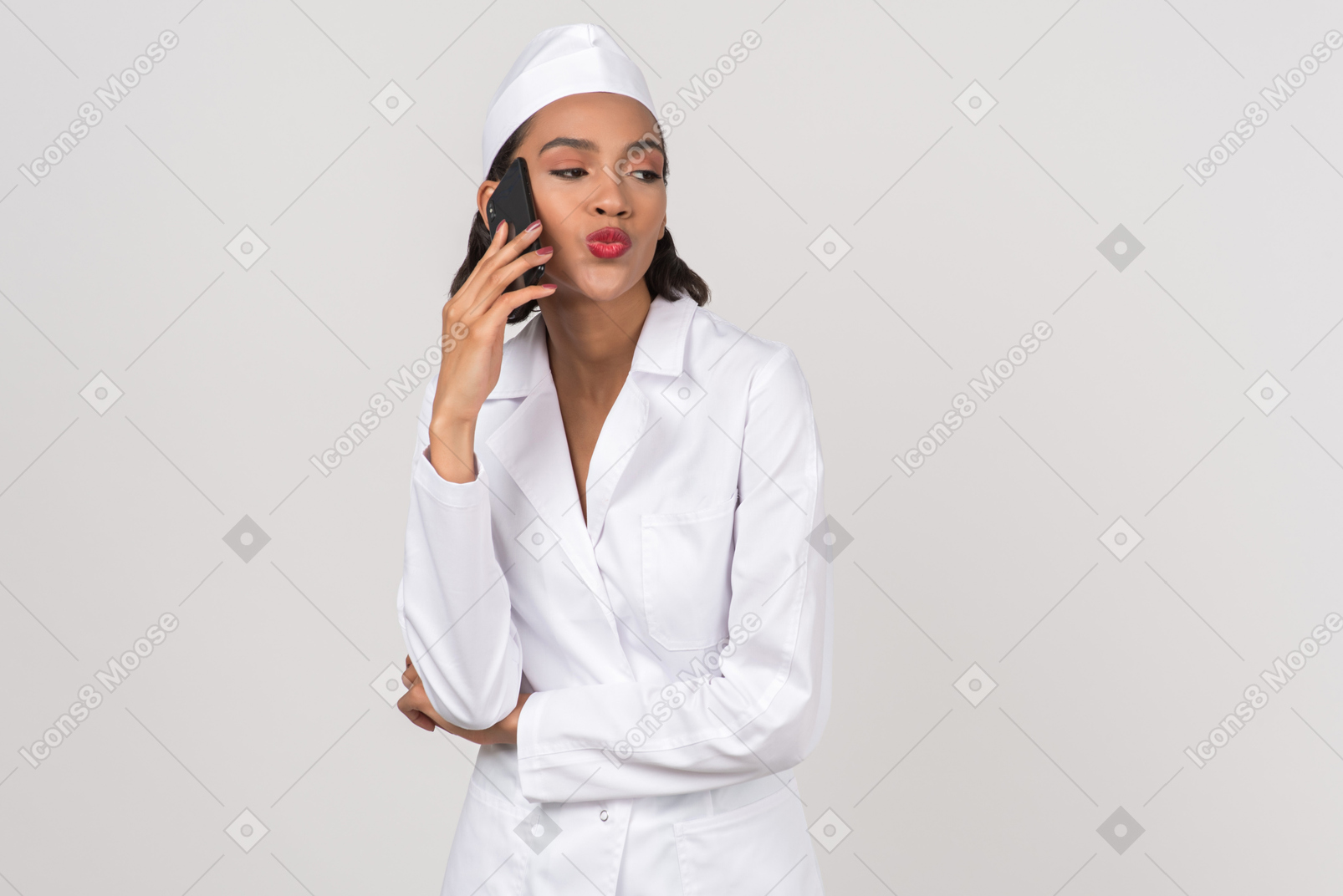 Flirty doctor talking on the phone