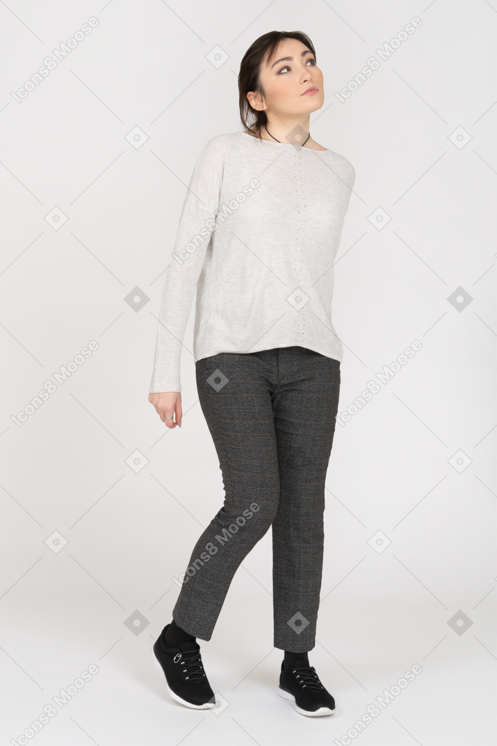 Young woman in casual clothing isolated over white background