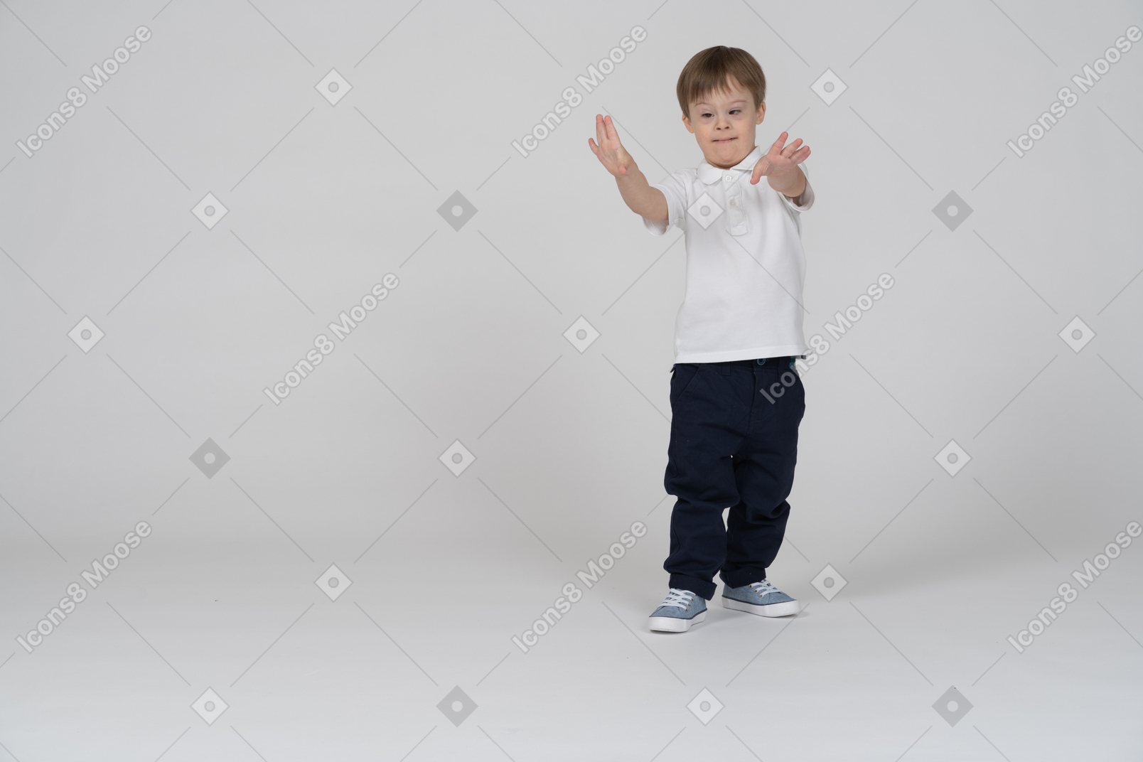 Front view of a boy reaching out with his hands