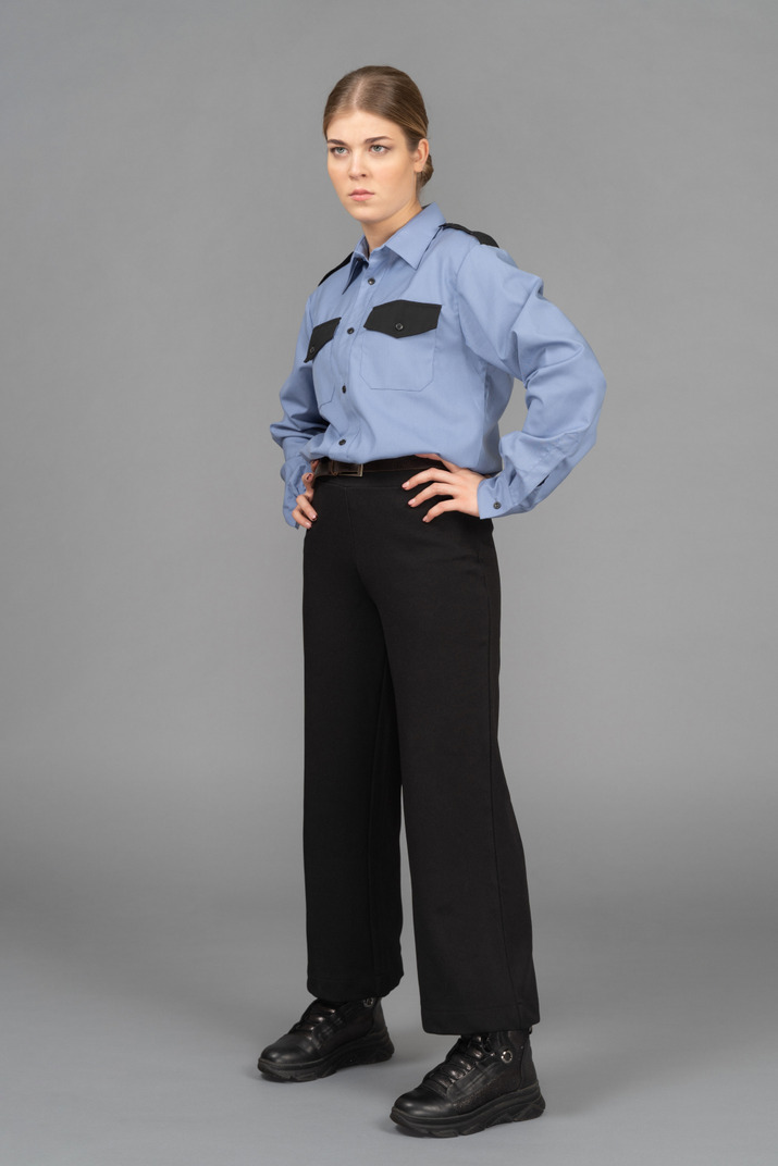 Female security guard looking with a suspicion