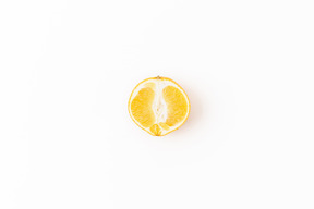 Half of orange on white background