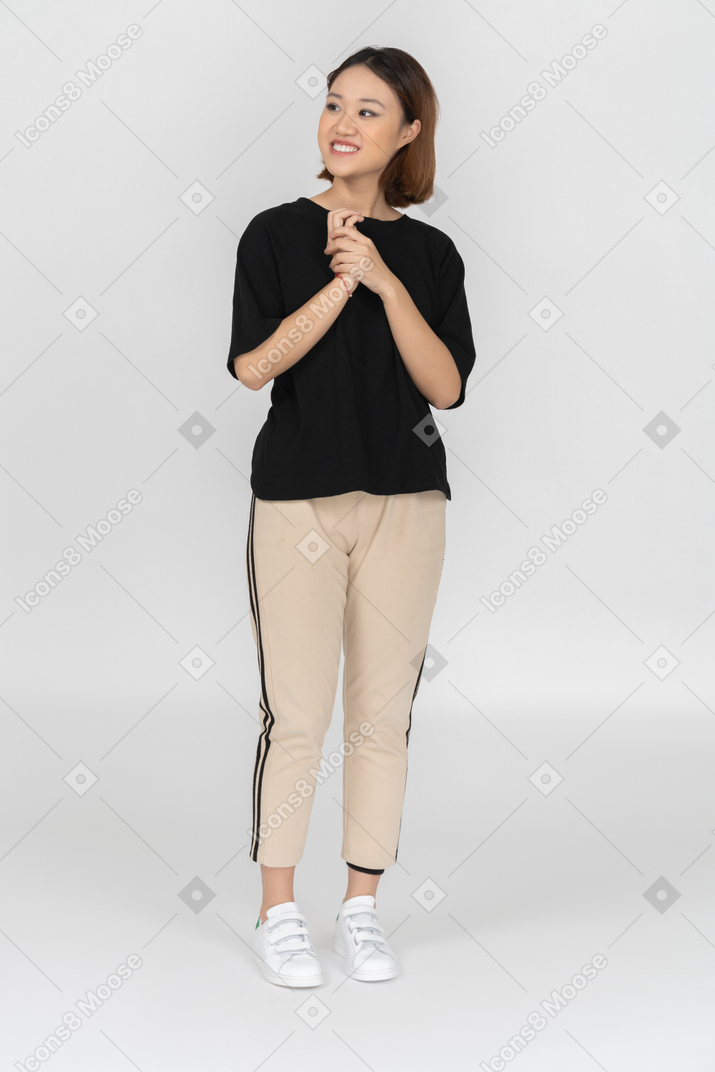Smiling young woman standing