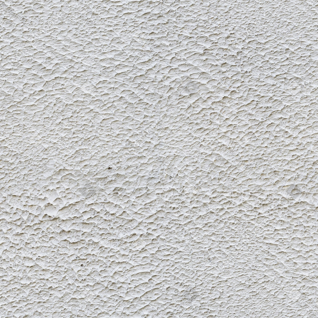 A close up of a white wall