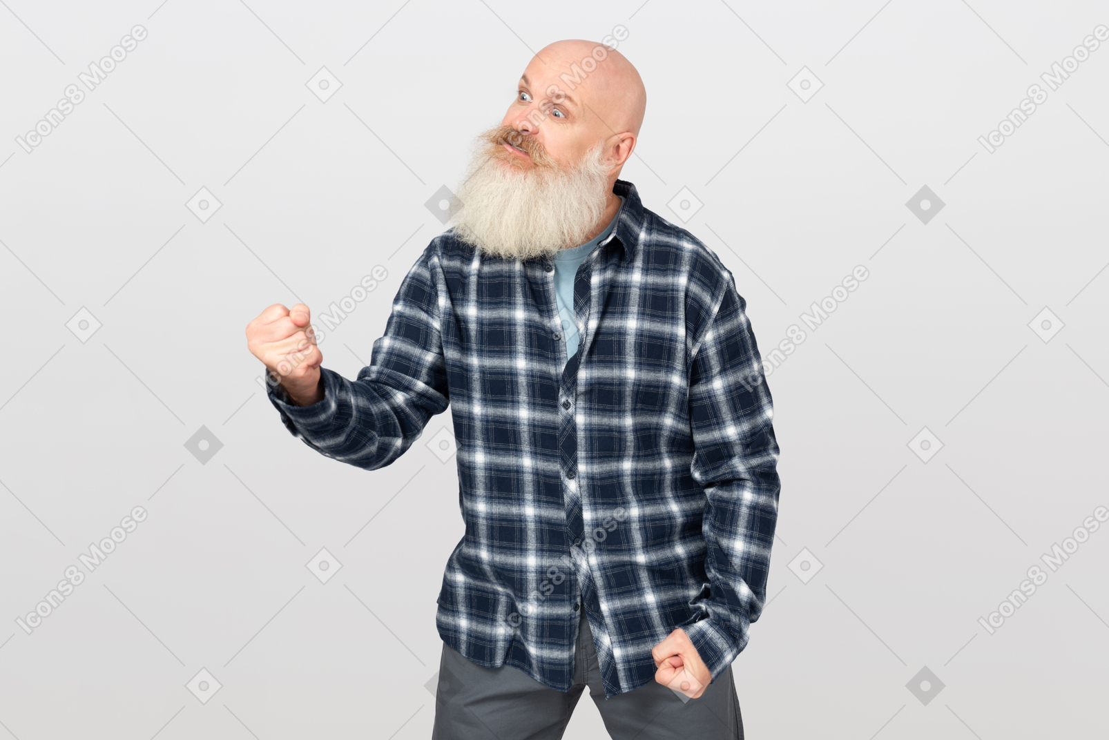 Angry mature bearded man showing his fist