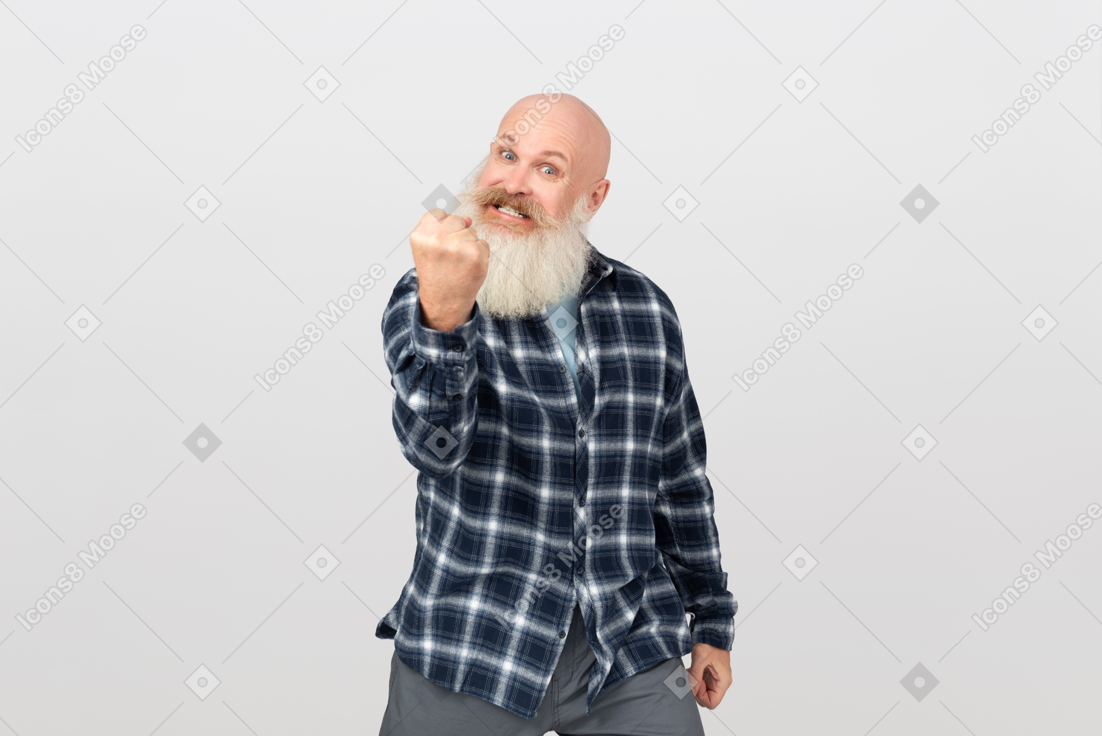 Angry mature bearded man showing his fist