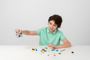 Boy playing with construction set