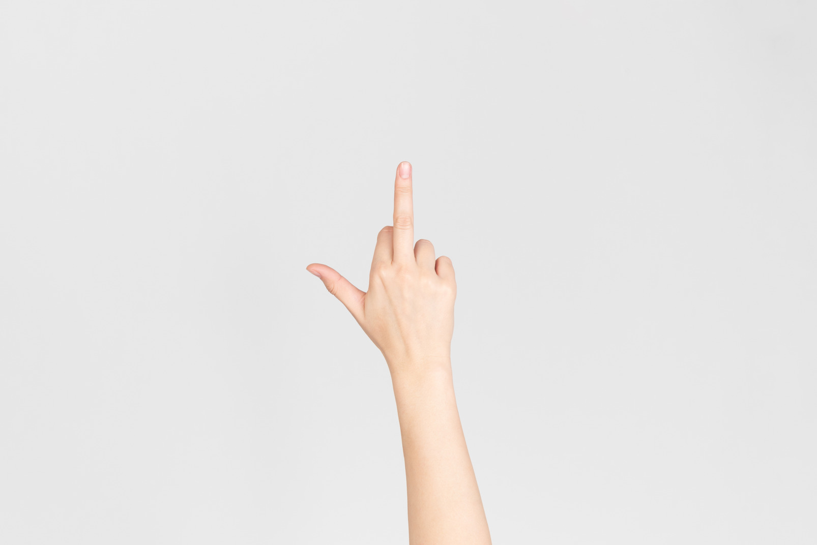 Female hand showing middle finger
