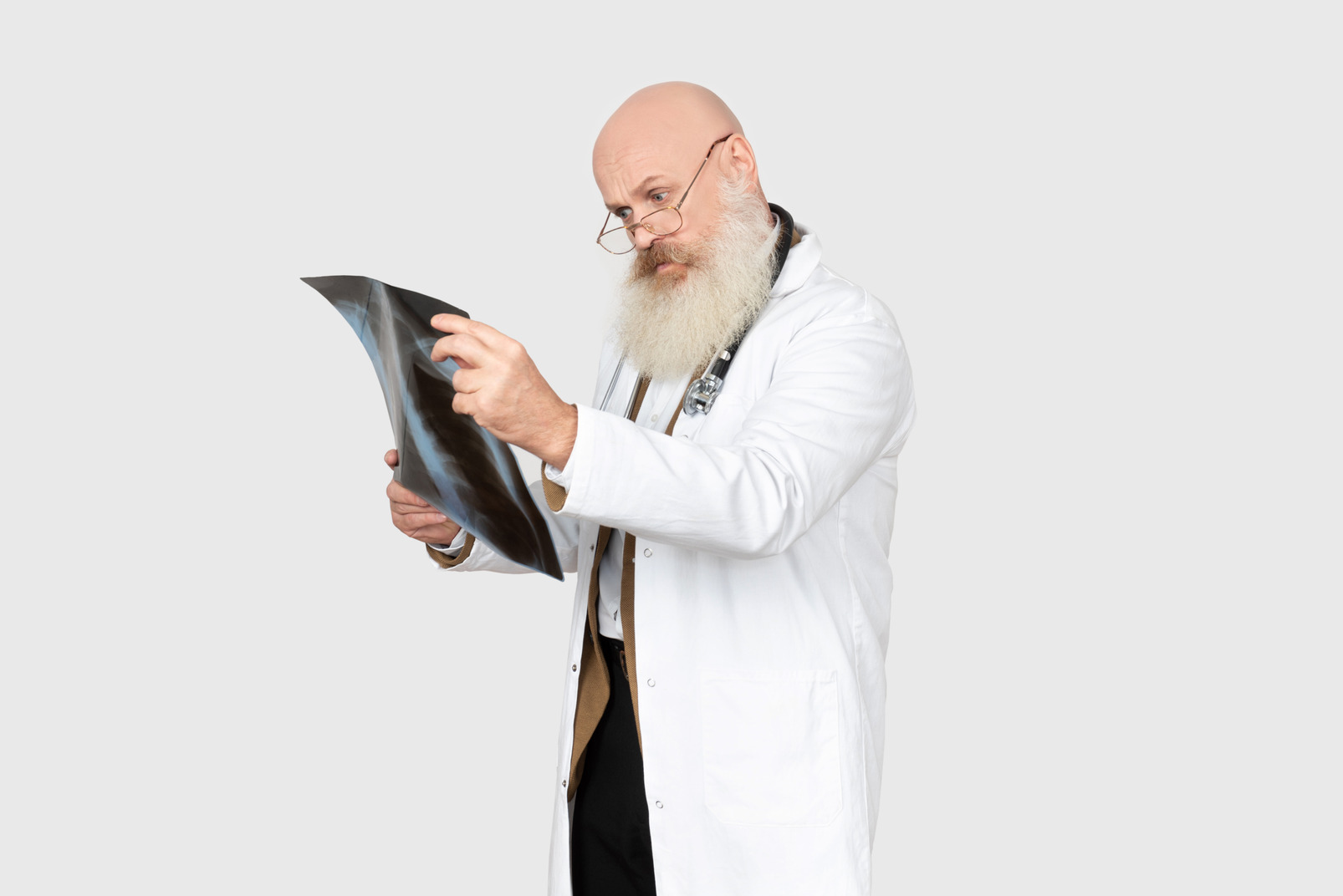 Mature doctor holding an x-ray