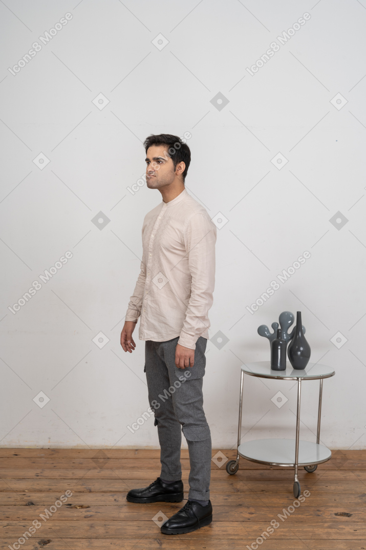 Side view of an angry man in casual clothes