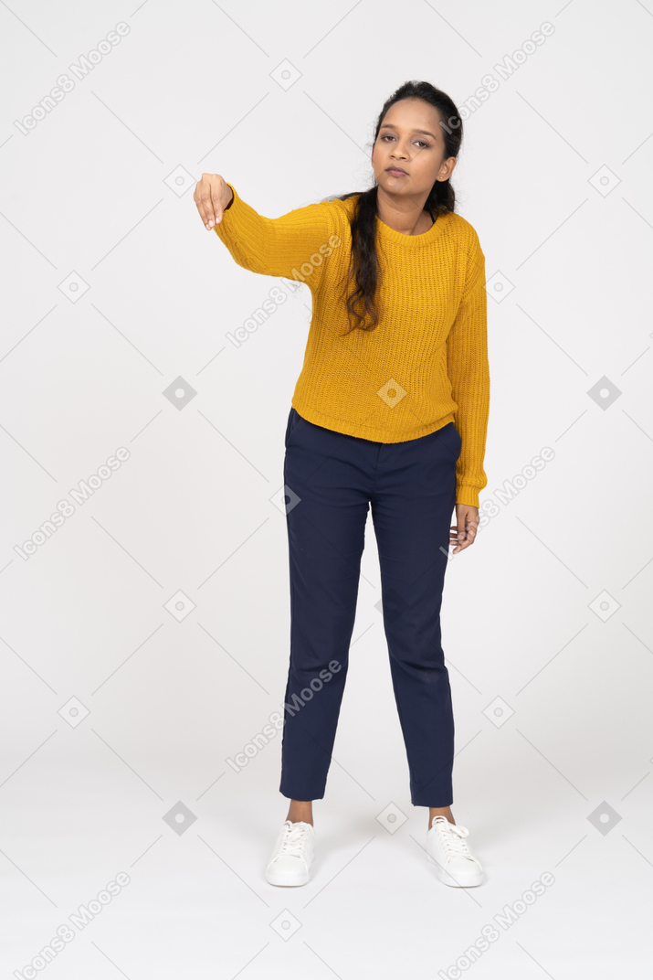 Front view of a girl in casual clothes showing direction