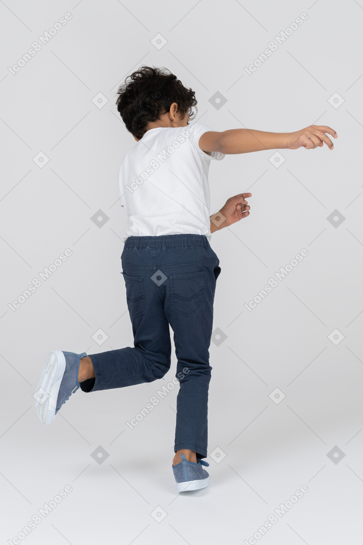 A boy running around
