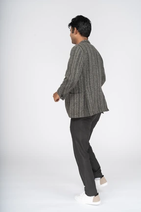Man in suit dancing