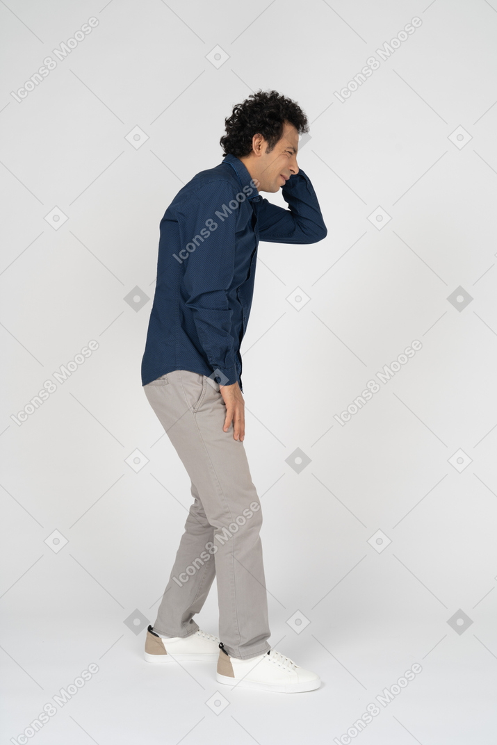Side view of a man in casual clothes