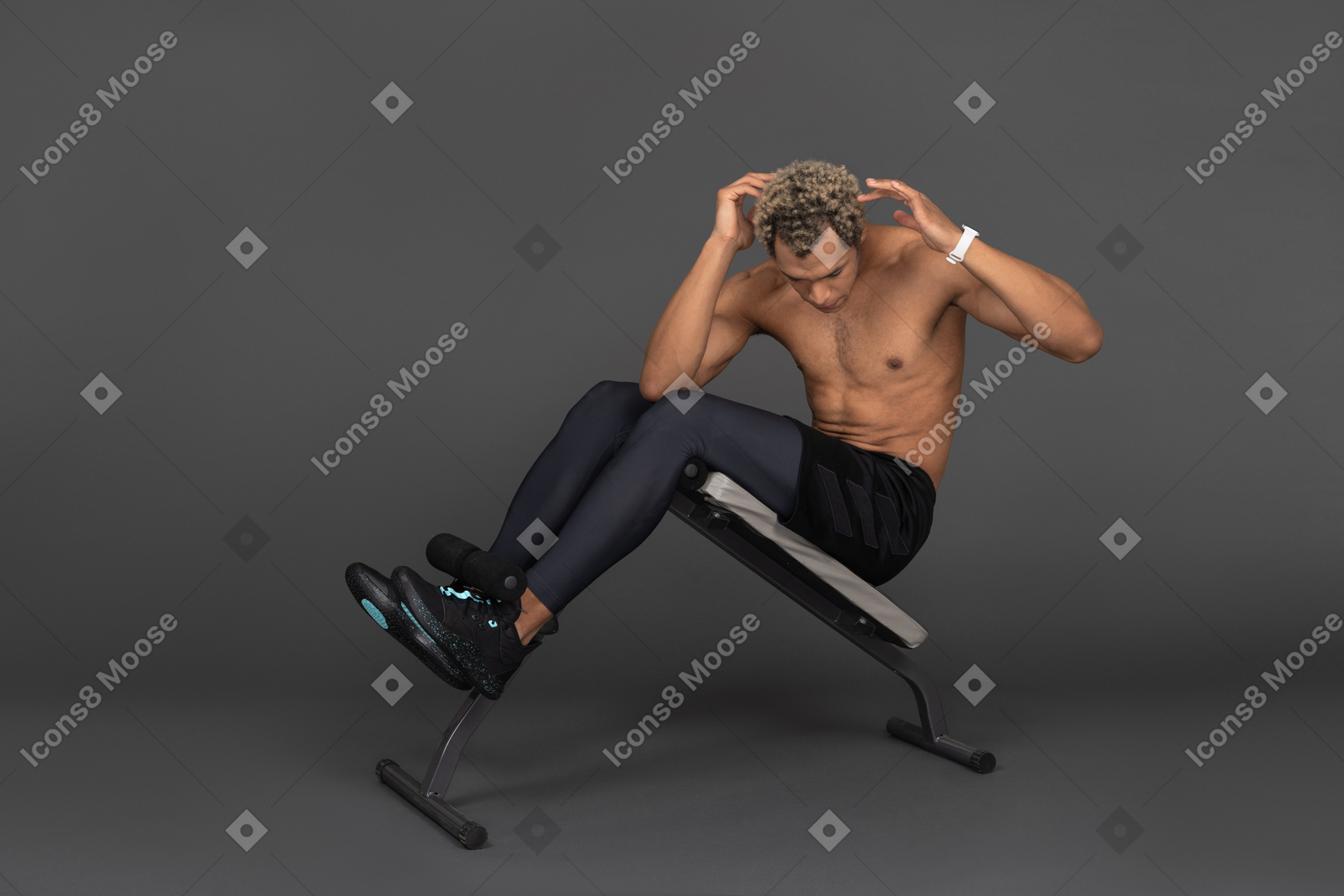 Side view of a shirtless afro man doing crunches