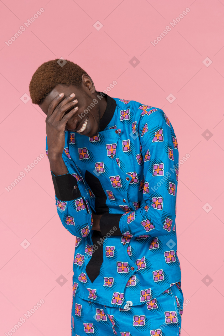 Black man in blue pajamas