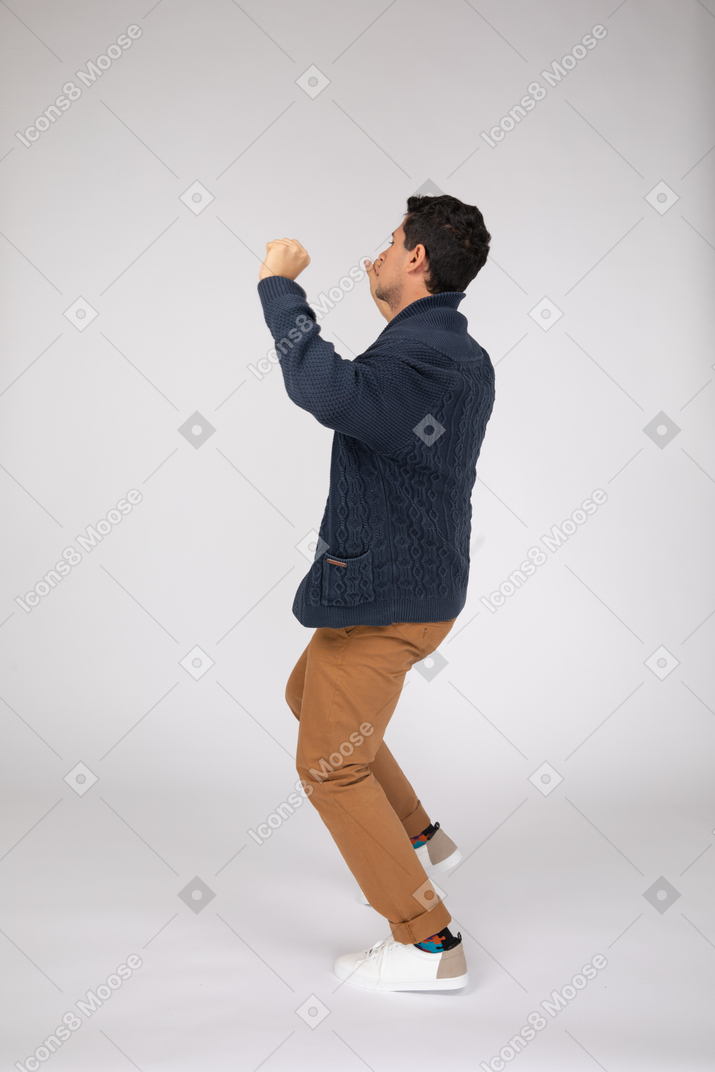 Man in casual clothes dancing