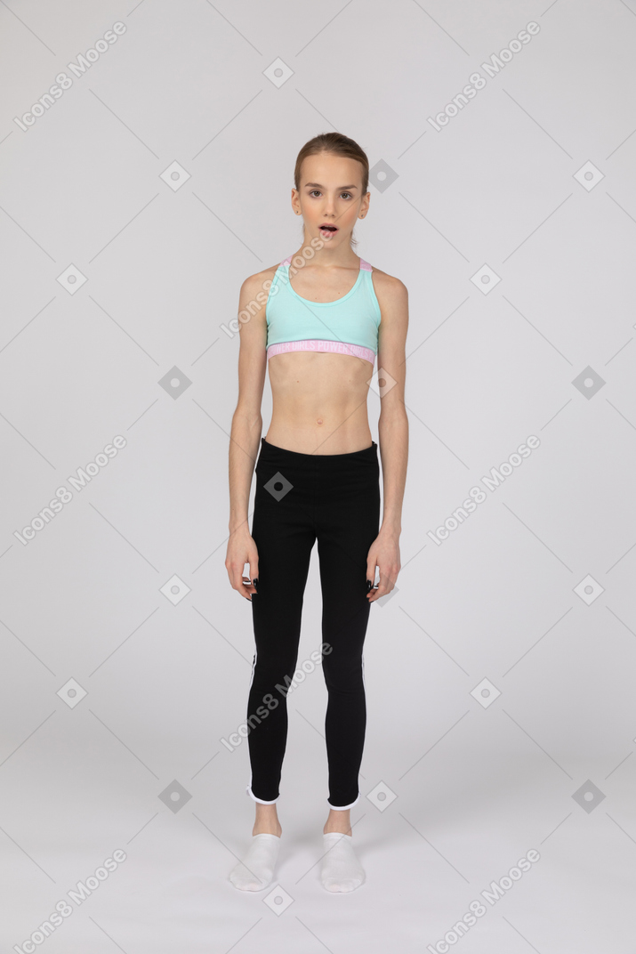 Shocked teen girl in sportswear