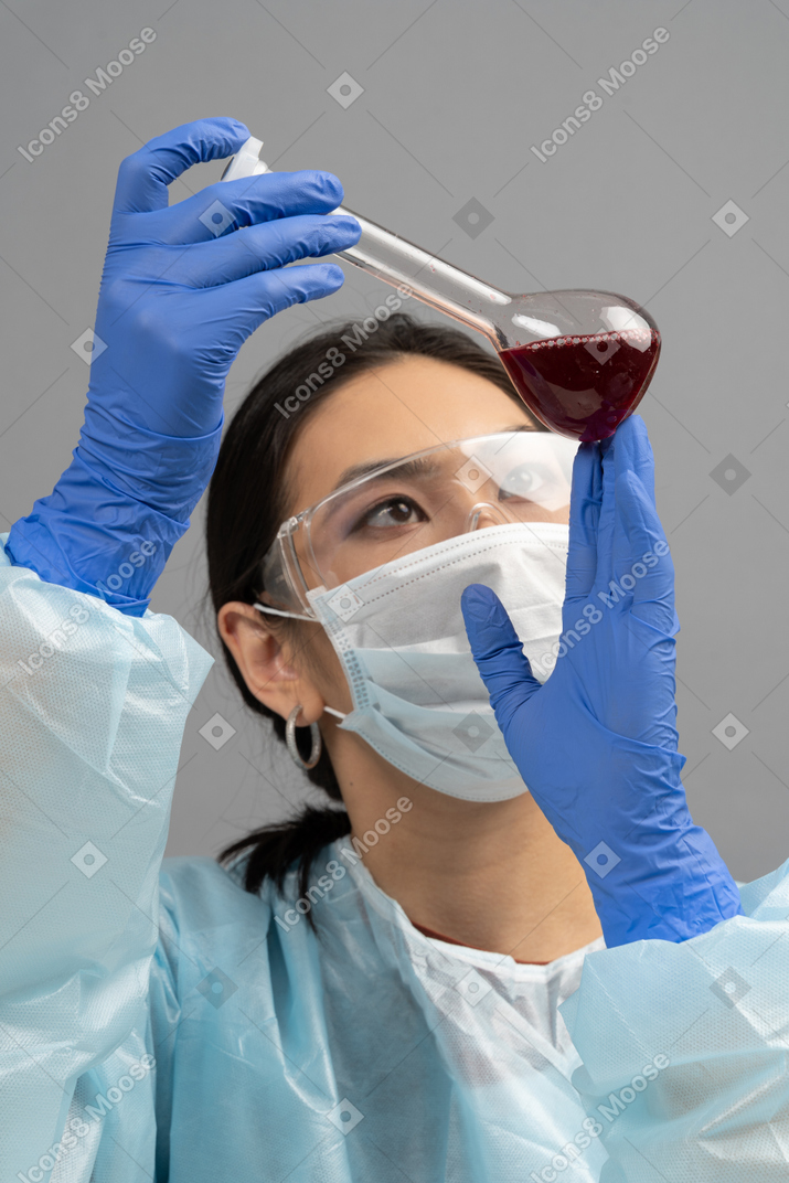 Portrait of medical worker with tube