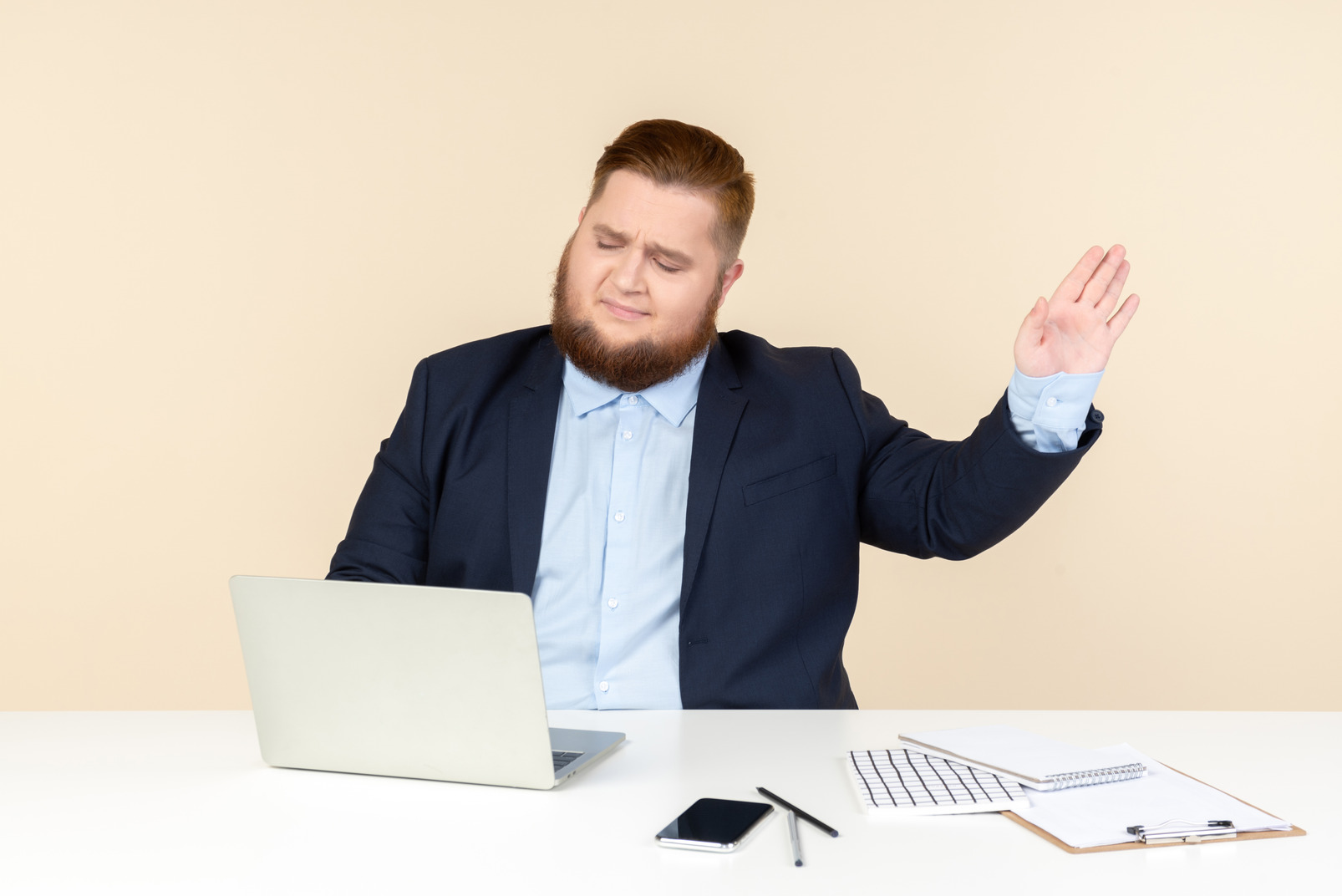 Not worried about anything young overweight office worker sitting at the office desk