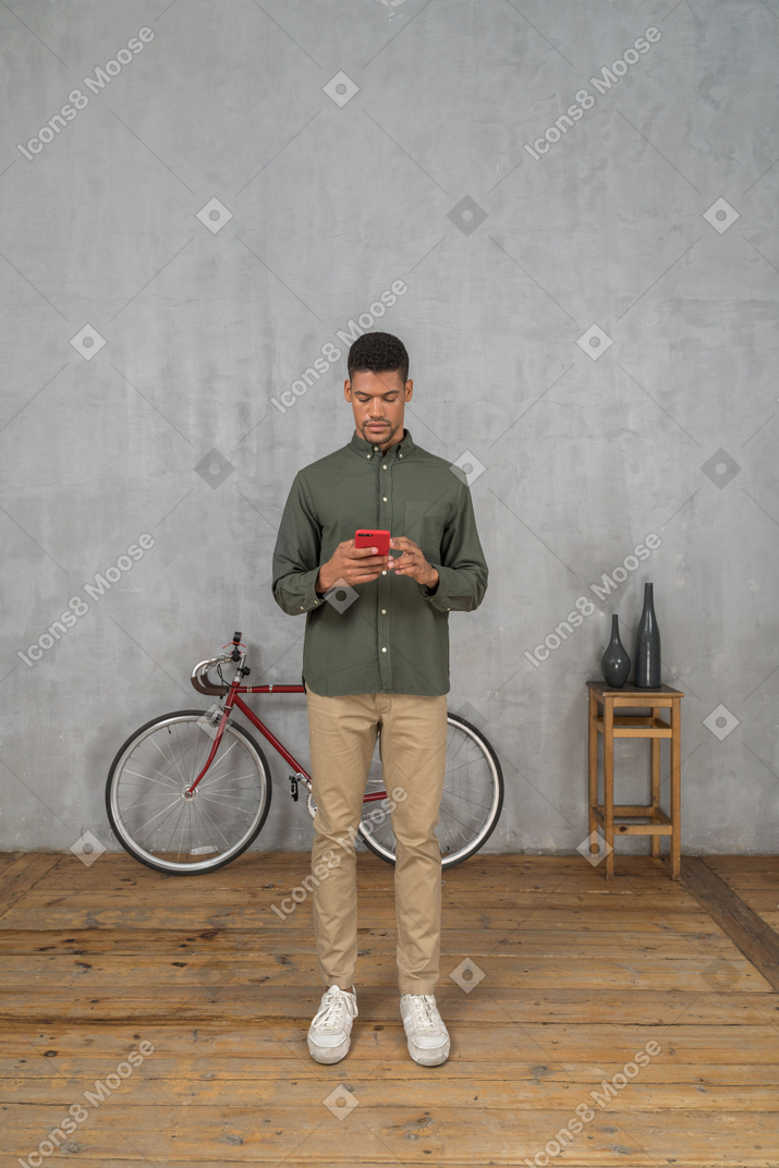 Front view of a man on his phone