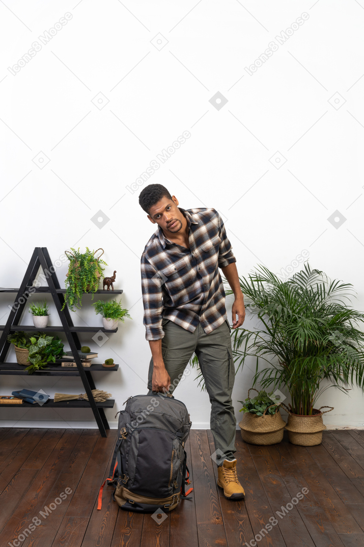 Good looking young man with a backpack