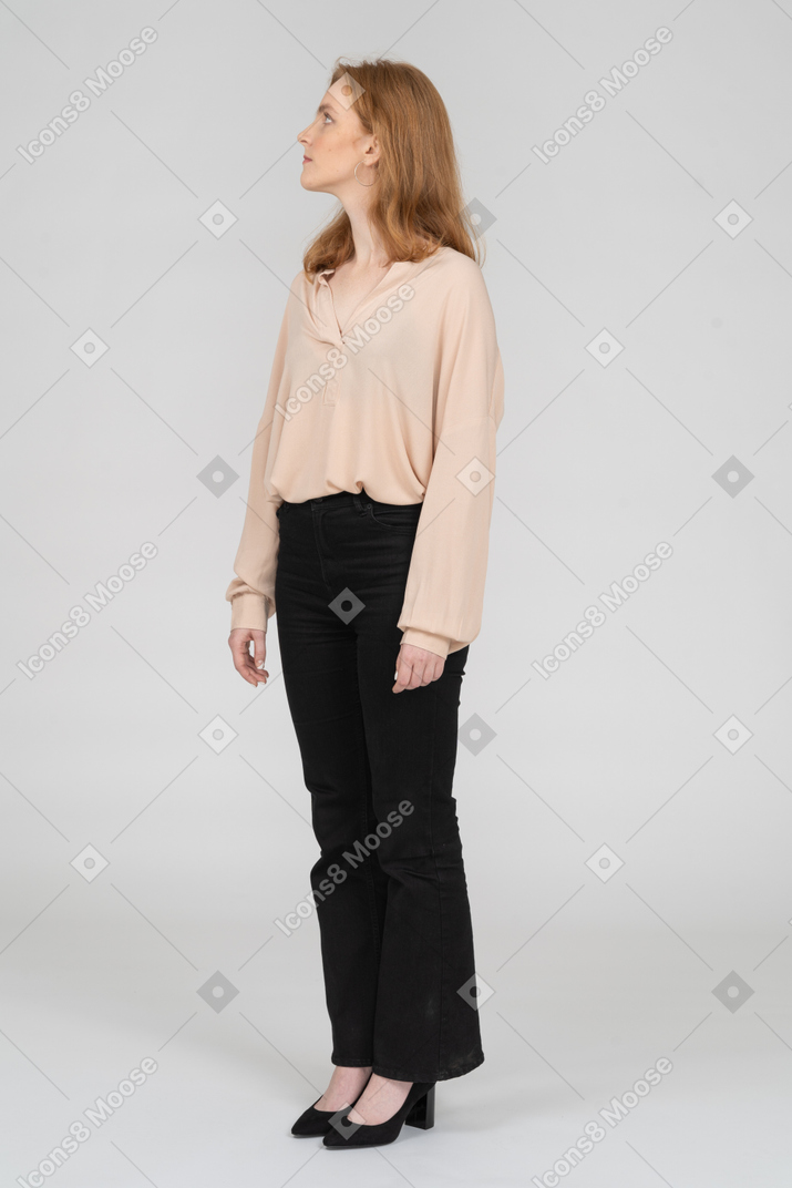 Woman in beautiful blouse standing