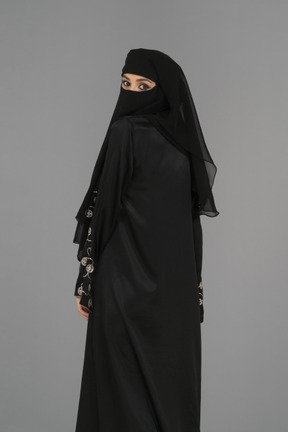 A completely covered muslim woman