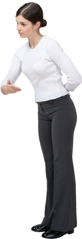 Side view of a woman in suit gesturing