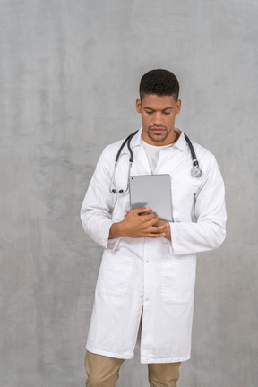 Healthcare worker with a tablet