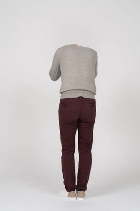 Man in casual clothes posing