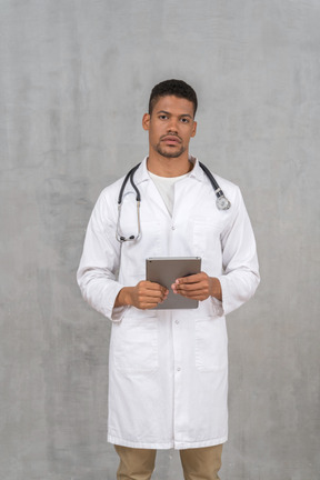 Medical professional with a tablet