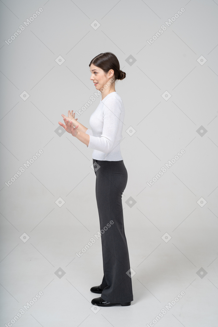 Side view of a woman gesturing