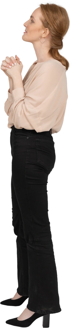 Woman in beautiful blouse standing